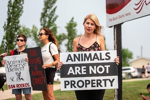 MIKAELA MACKENZIE / WINNIPEG FREE PRESS

Danae Tonge protests outside of the Manitoba Stampede in Morris on Saturday, July 22, 2023. For Tyler story.
Winnipeg Free Press 2023