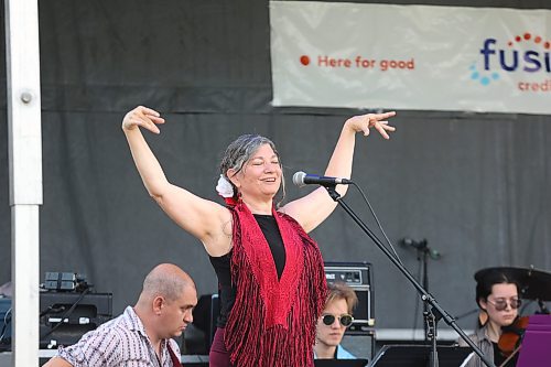 Christine Penner, representing Flamenco on the Prairies, performs on stage at Rideau Park on Sunday, the final day of the inaugural Salamander Summer Music Festival. (Kyle Darbyson/The Brandon Sun)