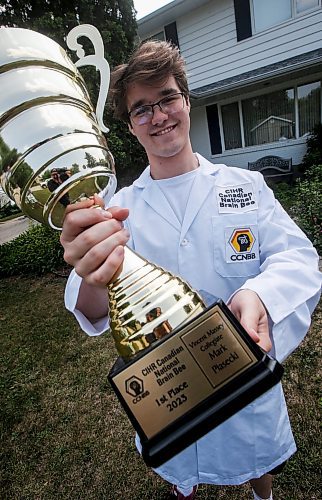 JOHN WOODS / WINNIPEG FREE PRESS
Mark Piasecki is photographed outside his house in Winnipeg, Monday, July 24, 2023. Piasecki was named the 2023 Canadian National Brain Bee champion and will represent Canada against 40 other nations in the International Brain Bee competition in Washington next month. The Brain Bee is a neuroscience competition for teens.

Reporter: graham