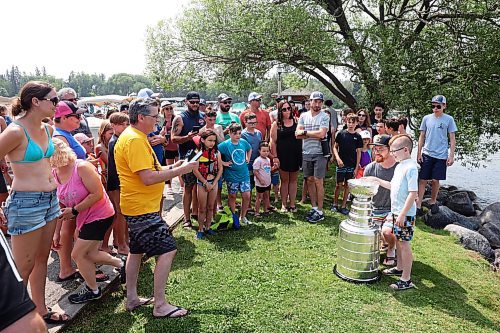 24072023
Hockey fans got a chance to get up close with the Stanley Cup on the pier at Clear Lake in Riding Mountain National Park on Monday as Vegas Golden Knights' general manager and former Brandon Wheat Kings owner, general manager and coach Kelly McCrimmon had the cup up in Wasagaming for the afternoon. The Vegas Golden Knights won the Stanley Cup championship earlier this year. (Tim Smith/The Brandon Sun)
