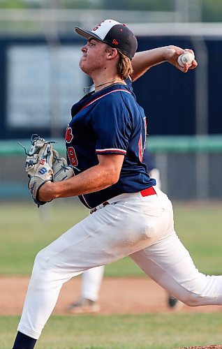 JOHN WOODS / WINNIPEG FREE PRESS
Elmwood Giants&#x2019; Riley Craw (18) pitches against the St Boniface Legionaires in game one of the best of five MJBL championship series at Koskie Field in Winnipeg, Monday, July 24, 2023. 

Reporter: frey-sam