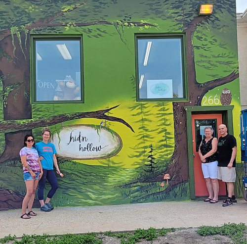 Local artists Meaghan Peters and Katy Martin collaborated with with Belinda and Daryl Critchlow, owners of Hid'n Hollow, to create enchanted murals on the inside and outside of the toy store. (Miranda Leybourne/The Brandon Sun)