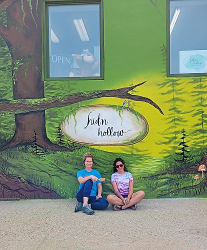 Local artists Katy Martin and Meghan Peters left their artistic stamp on the outside of local toy store Hid'n Hollow on the weekend on July 22 and 23. (Miranda Leybourne/The Brandon Sun)