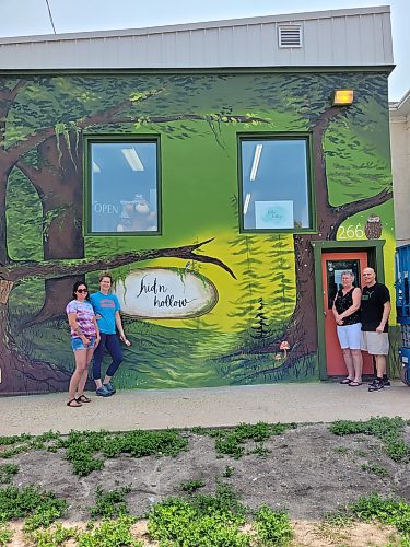 Local artists Meaghan Peters and Katy Martin collaborated with with Belinda and Daryl Critchlow, owners of Hid'n Hollow, to create enchanted murals on the inside and outside of the toy store. (Miranda Leybourne/The Brandon Sun)
