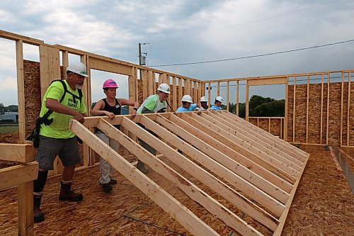 Erecting the party wall during the Women Build for Habitat for Humanity, in the 700 Block of Franklin Street in Brandon on Tuesday. (Michele McDougall/The Brandon Sun)