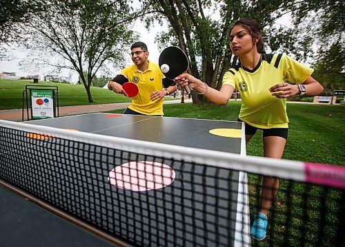 JOHN WOODS / WINNIPEG FREE PRESS
Jaspreet Kaur and Carlos Cuadra, executive director of the Manitoba Table Tennis Association (MTTA) give a table tennis demonstration at the Forks in Winnipeg, Tuesday, July 25, 2023. The MTTA gives demonstrations, instruction and playing opportunities every Tuesday evening until September.

Reporter: standup