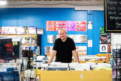 MIKAELA MACKENZIE / WINNIPEG FREE PRESS

Cavin Borody, owner of Winnipeg Record &amp; Tape Co, in his shop on Monday, July 24, 2023. Cavin is celebrating the 10th anniversary of the store, which stocks the city's largest selection of soul, R&amp;B, disco &amp; funk music. For Dave Sanderson story.
Winnipeg Free Press 2023