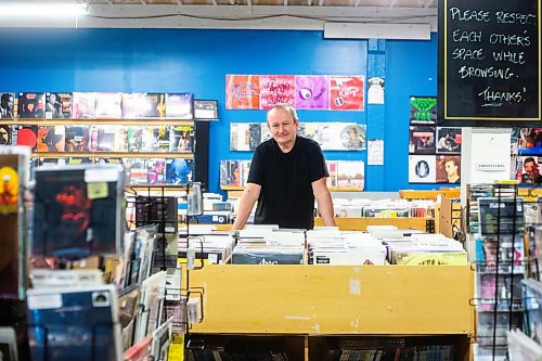 MIKAELA MACKENZIE / WINNIPEG FREE PRESS

Cavin Borody, owner of Winnipeg Record &amp; Tape Co, in his shop on Monday, July 24, 2023. Cavin is celebrating the 10th anniversary of the store, which stocks the city's largest selection of soul, R&amp;B, disco &amp; funk music. For Dave Sanderson story.
Winnipeg Free Press 2023