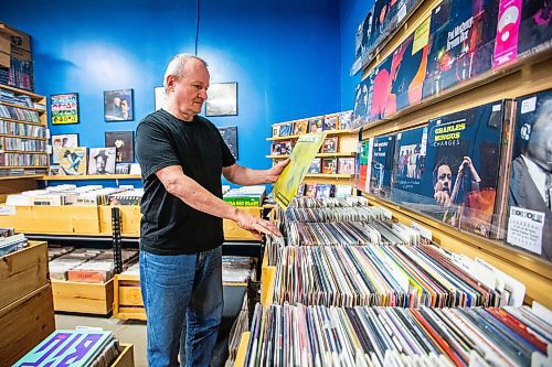 MIKAELA MACKENZIE / WINNIPEG FREE PRESS

Cavin Borody, owner of Winnipeg Record &amp; Tape Co, in his shop on Monday, July 24, 2023. Cavin is celebrating the 10th anniversary of the store, which stocks the city's largest selection of soul, R&amp;B, disco &amp; funk music. For Dave Sanderson story.
Winnipeg Free Press 2023