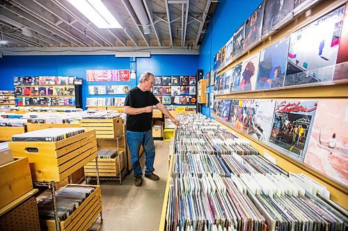 MIKAELA MACKENZIE / WINNIPEG FREE PRESS

Cavin Borody, owner of Winnipeg Record &amp; Tape Co, in his shop on Monday, July 24, 2023. Cavin is celebrating the 10th anniversary of the store, which stocks the city's largest selection of soul, R&amp;B, disco &amp; funk music. For Dave Sanderson story.
Winnipeg Free Press 2023