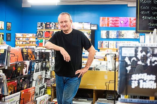 MIKAELA MACKENZIE / WINNIPEG FREE PRESS

Cavin Borody, owner of Winnipeg Record &amp; Tape Co, in his shop on Monday, July 24, 2023. Cavin is celebrating the 10th anniversary of the store, which stocks the city's largest selection of soul, R&amp;B, disco &amp; funk music. For Dave Sanderson story.
Winnipeg Free Press 2023