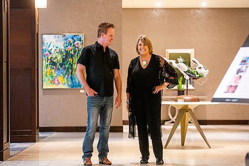 MIKAELA MACKENZIE / WINNIPEG FREE PRESS

Fairmont artists-in-residence Charlie Johnston (sculptor, left) and Amanda Onchulenko (painter) with their work in the hotel lobby in Winnipeg on Tuesday, July 25, 2023. For Al Small story.
Winnipeg Free Press 2023