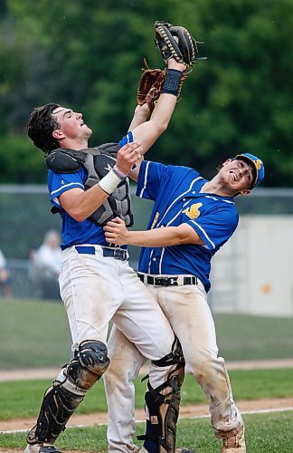JOHN WOODS / WINNIPEG FREE PRESS
St Boniface Legionaires pitcher Michael Wright (28) goes for the catch with his catcher in game two of the best of five MJBL championship series against the Elmwood Giants at Whittier Park in Winnipeg, Tuesday, July 25, 2023. 

Reporter: frey-sam