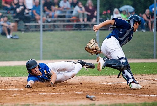 JOHN WOODS / WINNIPEG FREE PRESS
St Boniface Legionaires&#x2019; Ryder Duncan (35) dives for home against the Elmwood Giants in game two of the best of five MJBL championship series at Whittier Park in Winnipeg, Tuesday, July 25, 2023. 

Reporter: frey-sam