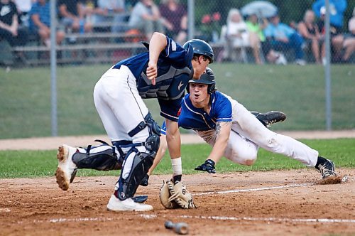 JOHN WOODS / WINNIPEG FREE PRESS
St Boniface Legionaires&#x2019; Ryder Duncan (35) dives for home against the Elmwood Giants in game two of the best of five MJBL championship series at Whittier Park in Winnipeg, Tuesday, July 25, 2023. 

Reporter: frey-sam