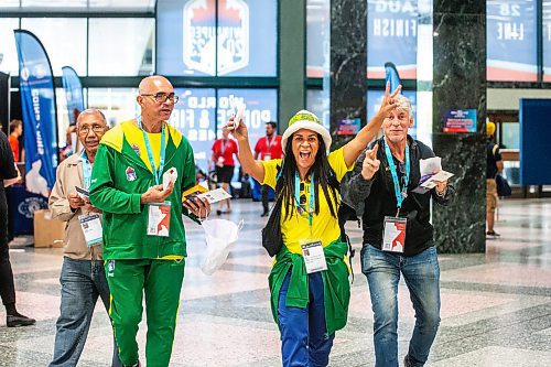 MIKAELA MACKENZIE / WINNIPEG FREE PRESS

Brazilians Ranes Costa (left), Antonio Josias, Marcia Valeria, and Marco Barritano walk to the World Police and Fire Games registration at the at the RBC Convention Centre on Wednesday, July 26, 2023. Standup.
Winnipeg Free Press 2023