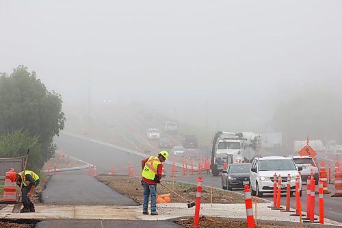 26072023
Traffic crossing the Daly Overpass in Brandon is shrouded in fog on Wednesday morning. (Tim Smith/The Brandon Sun)