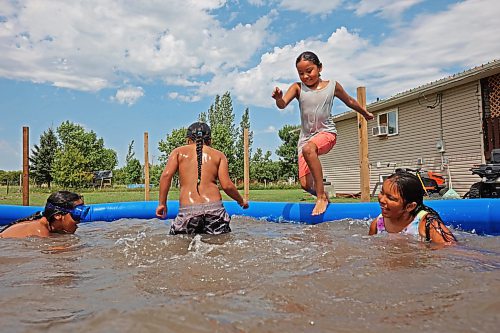 26072023
Zachary Beardy, Dimitrius Beardy, Maddison Hall and Prairie Wasicuna swim together on Zachary&#x2019;s seventh birthday at Sioux Valley Dakota Nation on a scorching hot Wednesday afternoon. (Tim Smith/The Brandon Sun)