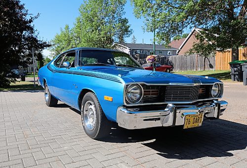 The front passenger side angle of Brandon's Grant Gillis's 1976 Dodge Dart Sport two-door coupe in a west-end neighbourhood on Thursday. (Michele McDougall/The Brandon Sun)