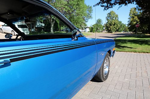 The black decorator trim package on Grant Gillis's 1976 Dodge Dart Sport two-door coupe in a west-end neighbourhood in Brandon on Thursday. (Michele McDougall/The Brandon Sun)