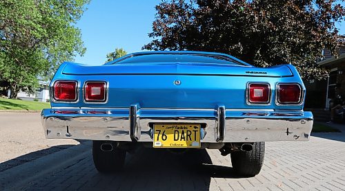 The tail lamps on the rear bumper with two lamps per side, each with a chrome trim ring on Grant Gillis's 1976 Dodge Dart Sport two-door coupe in a west-end neighbourhood in Brandon on Thursday. (Michele McDougall/The Brandon Sun)
