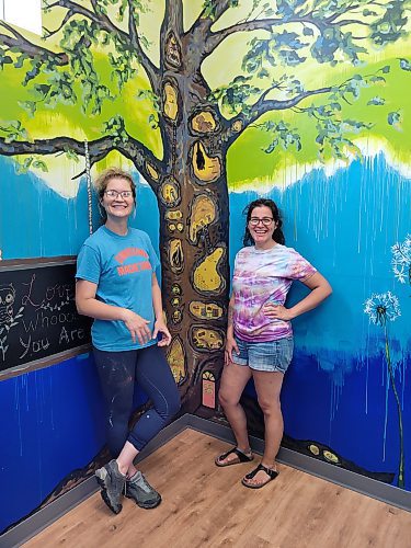 Katy Martin and Meaghan Peters, local Neepawa artists, painted murals on the inside and outside of new toy store Hid'n Hollow. ArtsForward, Neepawa's arts and entertainment hub, also partnered with local artists and the Neepawa Men's Shed to paint benches in town. It was all part of a July 22 event that celebrated artists and culture in the community. (Miranda Leybourne/The Brandon Sun)