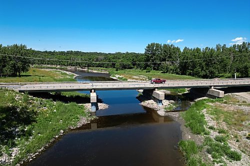 A truck passes over the Highway 2 bridge over the Souris River southwest of Wawanesa on Thursday. The bridge will receive upgrades including flood protection measures totalling around $1.7 million, the province announced on Thursday. (Tim Smith/The Brandon Sun)