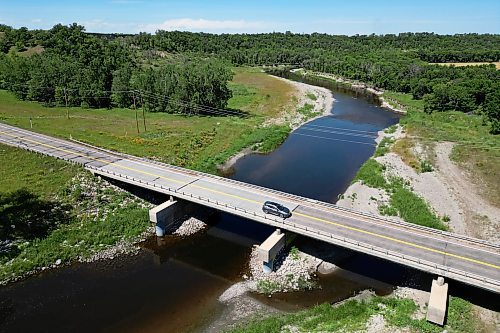 27072023
A car passes over the Highway 2 bridge over the Souris River southwest of Wawanesa on Thursday.  (Tim Smith/The Brandon Sun)