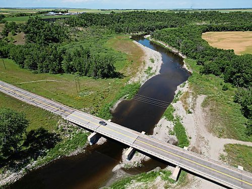 27072023
A car passes over the Highway 2 bridge over the Souris River southwest of Wawanesa on Thursday.  (Tim Smith/The Brandon Sun)