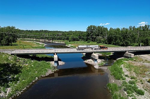 27072023
A truck passes over the Highway 2 bridge over the Souris River southwest of Wawanesa on Thursday. (Tim Smith/The Brandon Sun)