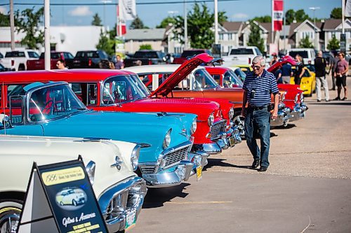 MIKAELA MACKENZIE / WINNIPEG FREE PRESS

Richard Facia takes a look at the cars at the first annual Show &amp; Shine car show at the Gauthier Cadillac Experience Centre on Thursday, July 27, 2023. Standup.
Winnipeg Free Press 2023