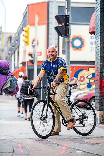 MIKAELA MACKENZIE / WINNIPEG FREE PRESS

Kerry LeBlanc, who is leading the third annual Bridge to Nowhere Bike, downtown on Friday, July 28, 2023. For philanthropy story.
Winnipeg Free Press 2023