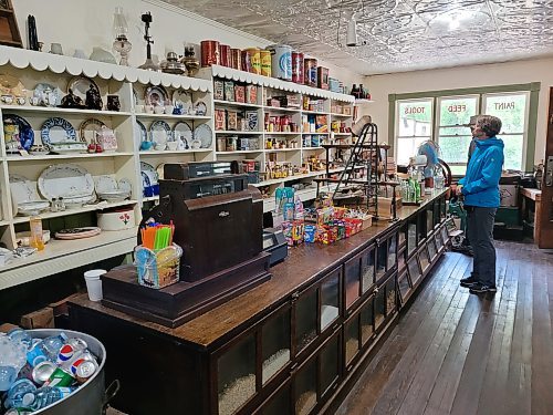 A customer browses the shelves inside of the general store at Homesteaders' Village at the Threshermen's Reunion & Stampede in Austin, Man. (Miranda Leybourne/The Brandon Sun)