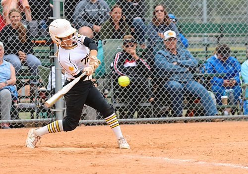 Westman Magic batter Kendra Grift (22) connects with the ball for a base hit during Softball Manitoba&#x2019;s under-15 AAA provincial championship at Ashley Neufeld Softball Complex on Friday. (Perry Bergson/The Brandon Sun)
July 28, 2023