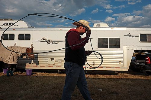 27072023
Team roper Ty Shea of Swift Current, SK, practices his roping before the first go-round of the Manitoba Threshermen&#x2019;s Reunion and Stampede rodeo near Austin, Manitoba on Thursday evening.  (Tim Smith/The Brandon Sun)