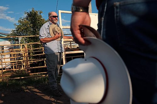 27072023
Cowboys hold their hats during the national anthem before the first go-round of the Manitoba Threshermen&#x2019;s Reunion and Stampede rodeo near Austin, Manitoba on Thursday evening.  (Tim Smith/The Brandon Sun)
