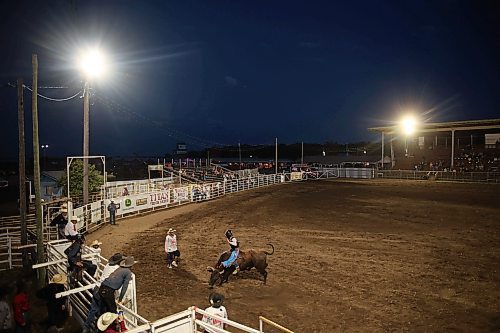 27072023
A bull rider competes during the first rodeo go-round during the Manitoba Threshermen&#x2019;s Reunion and Stampede near Austin, Manitoba on Thursday evening.  (Tim Smith/The Brandon Sun)