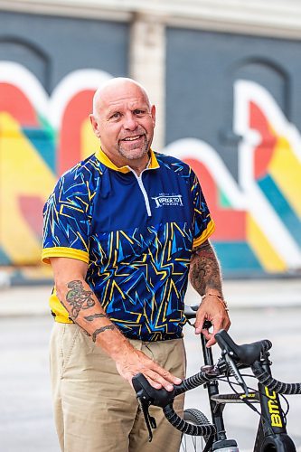 MIKAELA MACKENZIE / WINNIPEG FREE PRESS

Kerry LeBlanc, who is leading the third annual Bridge to Nowhere Bike, downtown on Friday, July 28, 2023. For philanthropy story.
Winnipeg Free Press 2023