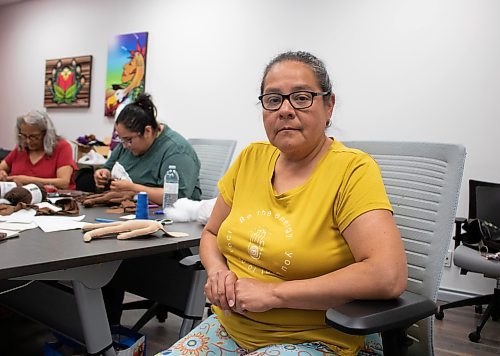 Mike Thiessen / Winnipeg Free Press 
Diane Maytwayashing facilitates a medicine doll making workshop put on by the Southern Chiefs&#x2019; Organization (SCO) Survivors&#x2019; Healing Program on Friday. The workshop was designed to bring comfort and healing to survivors of residential schools, day schools, the Sixties Scoop, and anyone experiencing trauma. For Tessa Adamski. 230728 &#x2013; Friday, July 28, 2023