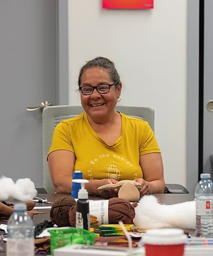 Mike Thiessen / Winnipeg Free Press 
Diane Maytwayashing facilitates a medicine doll making workshop put on by the Southern Chiefs&#x2019; Organization (SCO) Survivors&#x2019; Healing Program on Friday. The workshop was designed to bring comfort and healing to survivors of residential schools, day schools, the Sixties Scoop, and anyone experiencing trauma. For Tessa Adamski. 230728 &#x2013; Friday, July 28, 2023