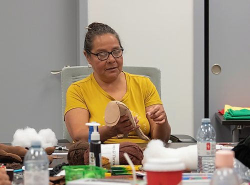 Mike Thiessen / Winnipeg Free Press 
Diane Maytwayashing facilitates a medicine doll making workshop put on by the Southern Chiefs&#x2019; Organization (SCO) Survivors&#x2019; Healing Program on Friday. The workshop was designed to bring comfort and healing to survivors of residential schools, day schools, the Sixties Scoop, and anyone experiencing trauma. For Tessa Adamski. 230728 &#x2013; Friday, July 28, 2023