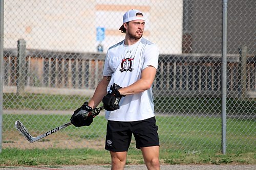Foxwarren's Dawson Barteaux warms up for the Olde English Road Hockey League final at Linden Lanes School on July 28. The 23-year-old defenceman signed a contract with the American Hockey League's Manitoba Moose last month. (Lucas Punkari/The Brandon Sun)