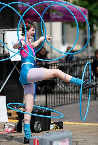 JOHN WOODS / WINNIPEG FREE PRESS
Sarah Teakle performs in her 80&#x2019;s Circus Show on the outdoor stage in Old Market Square during the Winnipeg Fringe Festival in Winnipeg, Sunday, July 30, 2023. 

Reporter: standup
