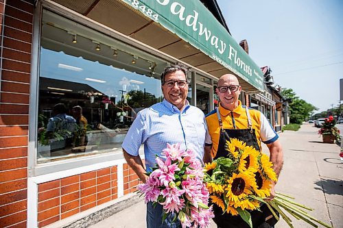 MIKAELA MACKENZIE / WINNIPEG FREE PRESS

Ernest (left) and Costa  Cholakis, co-owners of Broadway Florists, at the flower shop on Academy on Monday, July 31, 2023. They are celebrating 100 years open this September. For Gabby Piche story.
Winnipeg Free Press 2023