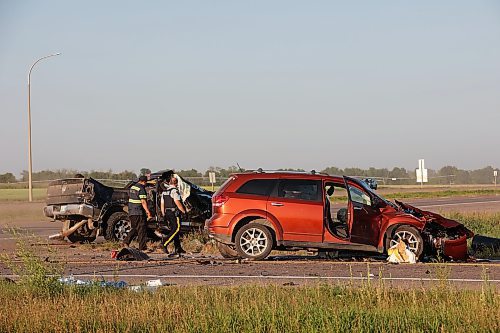 31072023
RCMP officers and tow truck operators work at the scene of a three vehicle collision at the intersection of Highway 5 and the Trans Canada Highway just north of Carberry on Monday evening. Three people involved were taken to hospital. The collision happened at the same location as the    June 15th collision between a bus and a semi trailer that claimed the lives of 17 passengers. (Tim Smith/The Brandon Sun)