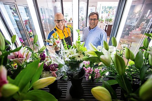MIKAELA MACKENZIE / WINNIPEG FREE PRESS

Costa (left) and Ernest Cholakis, co-owners of Broadway Florists, at the flower shop on Academy on Monday, July 31, 2023. They are celebrating 100 years open this September. For Gabby Piche story.
Winnipeg Free Press 2023