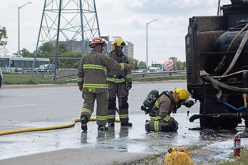 Mike Thiessen / Winnipeg Free Press 
Winnipeg Fire Department crews were called to a burning truck at Abinojii Mikanah and River Road around 3:00 pm today. 230731 &#x2013; Monday, July 31, 2023