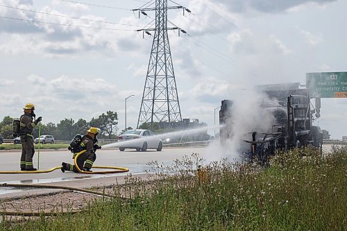 Mike Thiessen / Winnipeg Free Press 
Winnipeg Fire Department crews were called to a burning truck at Abinojii Mikanah and River Road around 3:00 pm today. 230731 &#x2013; Monday, July 31, 2023