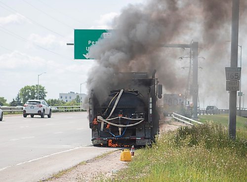 Mike Thiessen / Winnipeg Free Press 
Winnipeg Fire Department crews were called to a burning truck at Abinojii Mikanah and River Road around 3:00 pm today. 230731 &#x2013; Monday, July 31, 2023