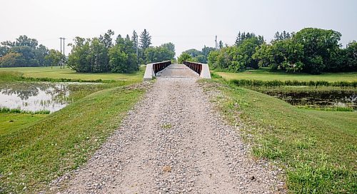 MIKE DEAL / WINNIPEG FREE PRESS
The footbridge which used to be a railway that crosses the Icelandic River in Arborg, MB.
230731 - Monday, July 31, 2023.